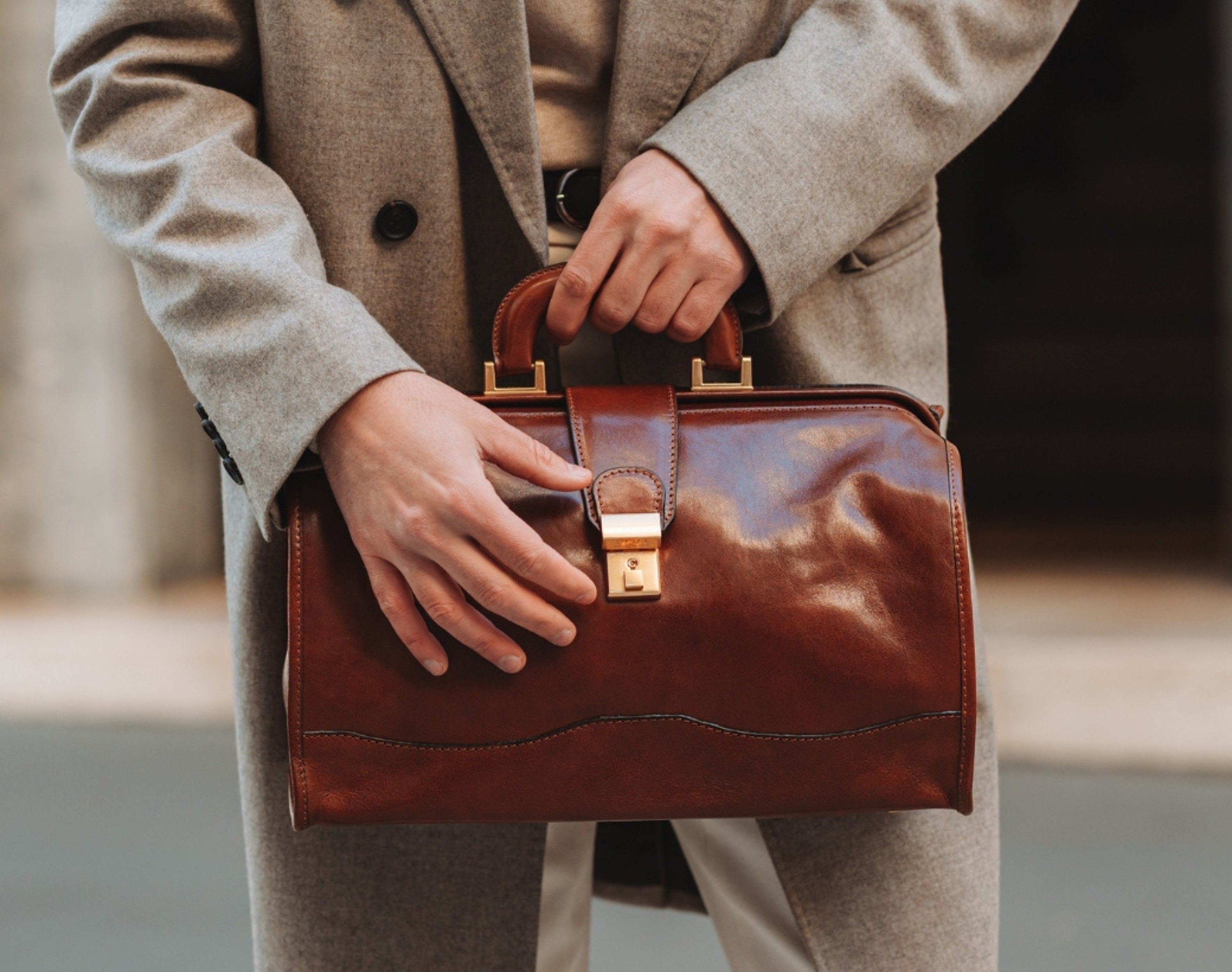 Man holding a full-grain leather doctor bag